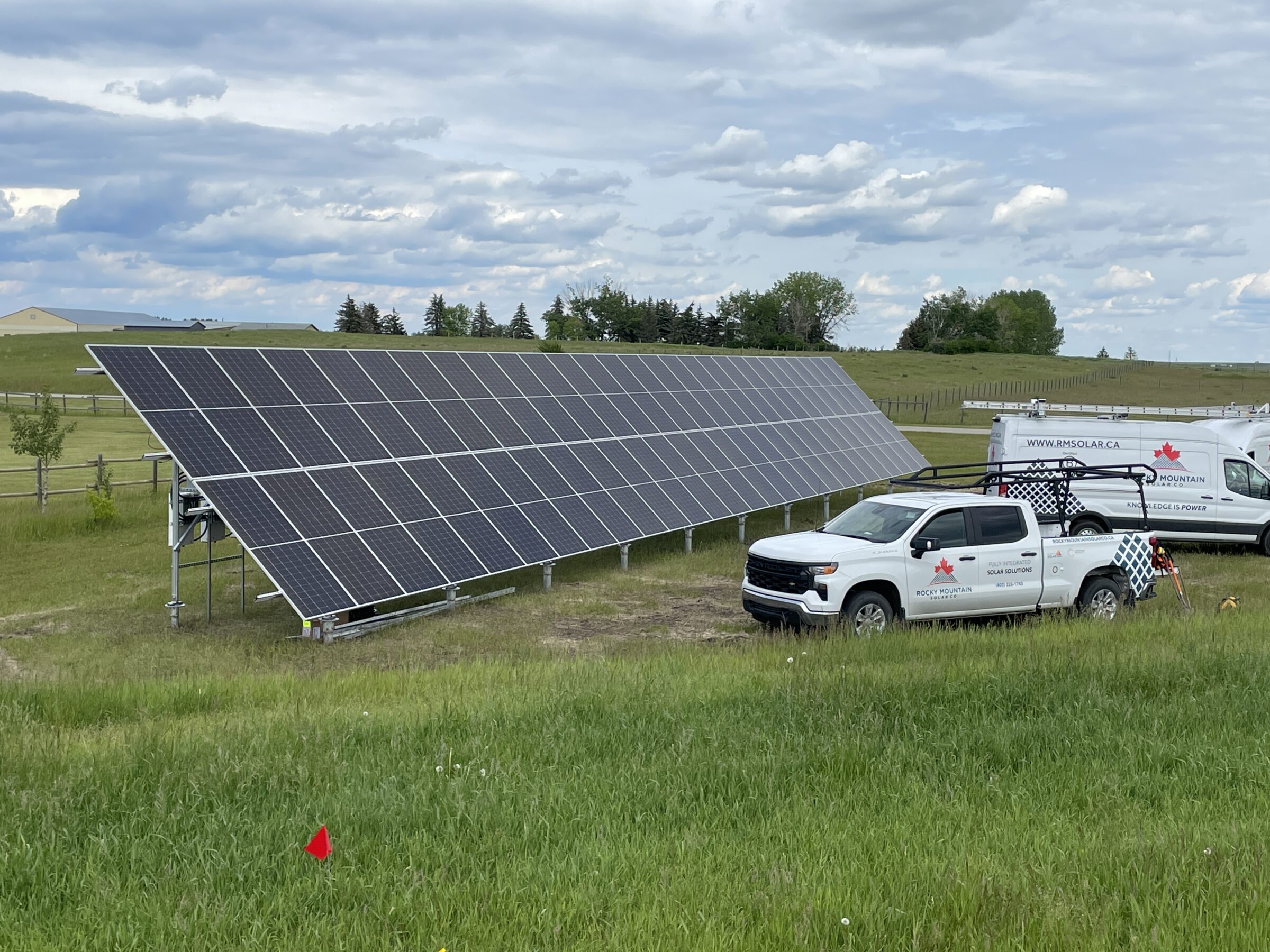 Large ground mount solar array installed by Calgary solar installers on a residential property