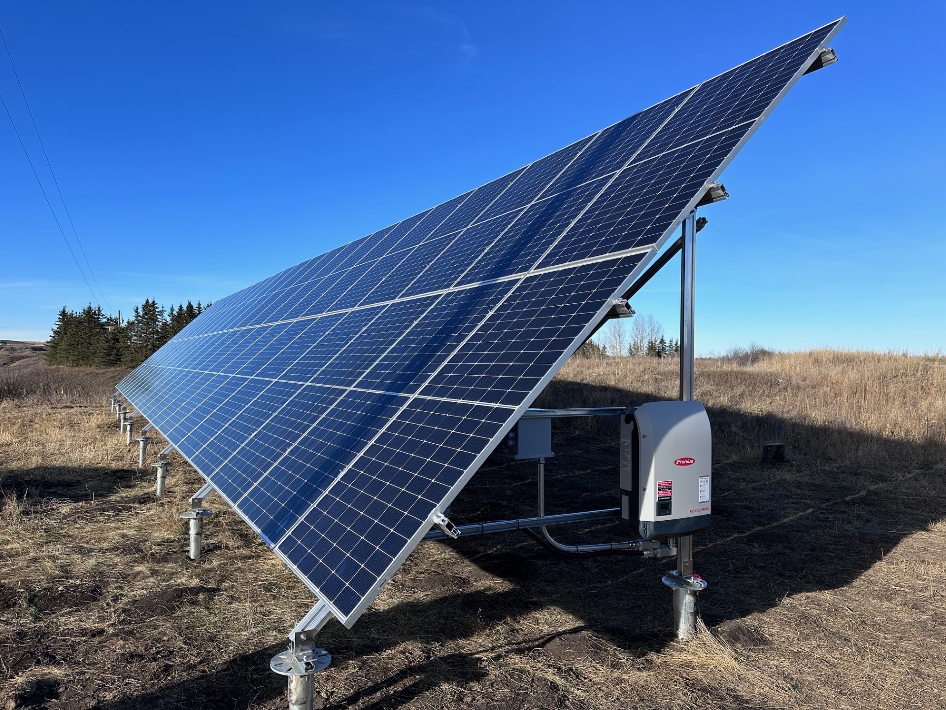 view of high-efficiency solar panels installed on a residential home by Calgary solar installers.