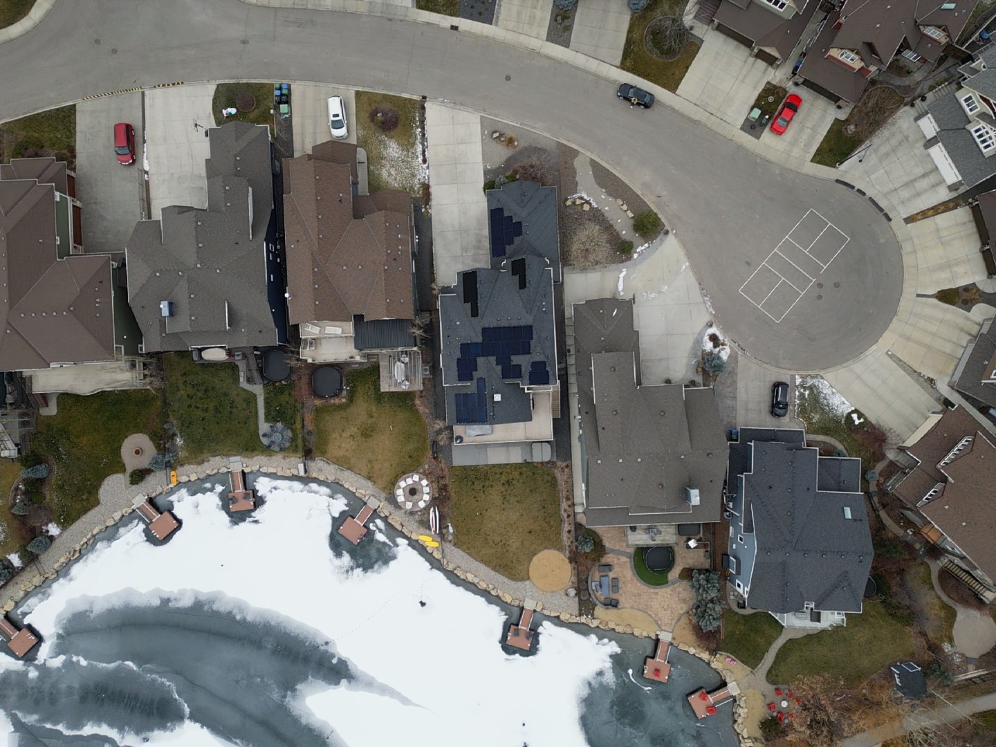 High-efficiency 18 kW residential solar panel system installed on a luxury home in Auburn Bay, SE Calgary, by Rocky Mountain Solar Co