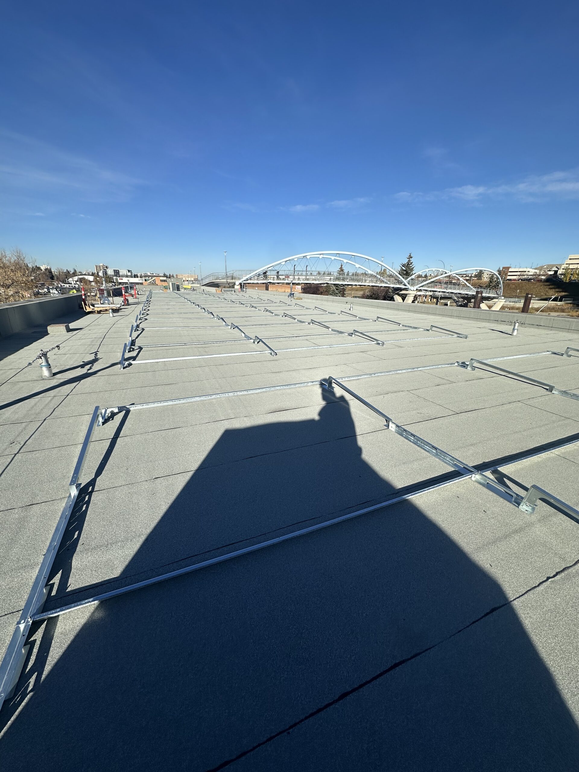 Aerial view of the 230 kW DC commercial solar array at Haysboro LRT station in SE Calgary by Rocky Mountain Solar Co.