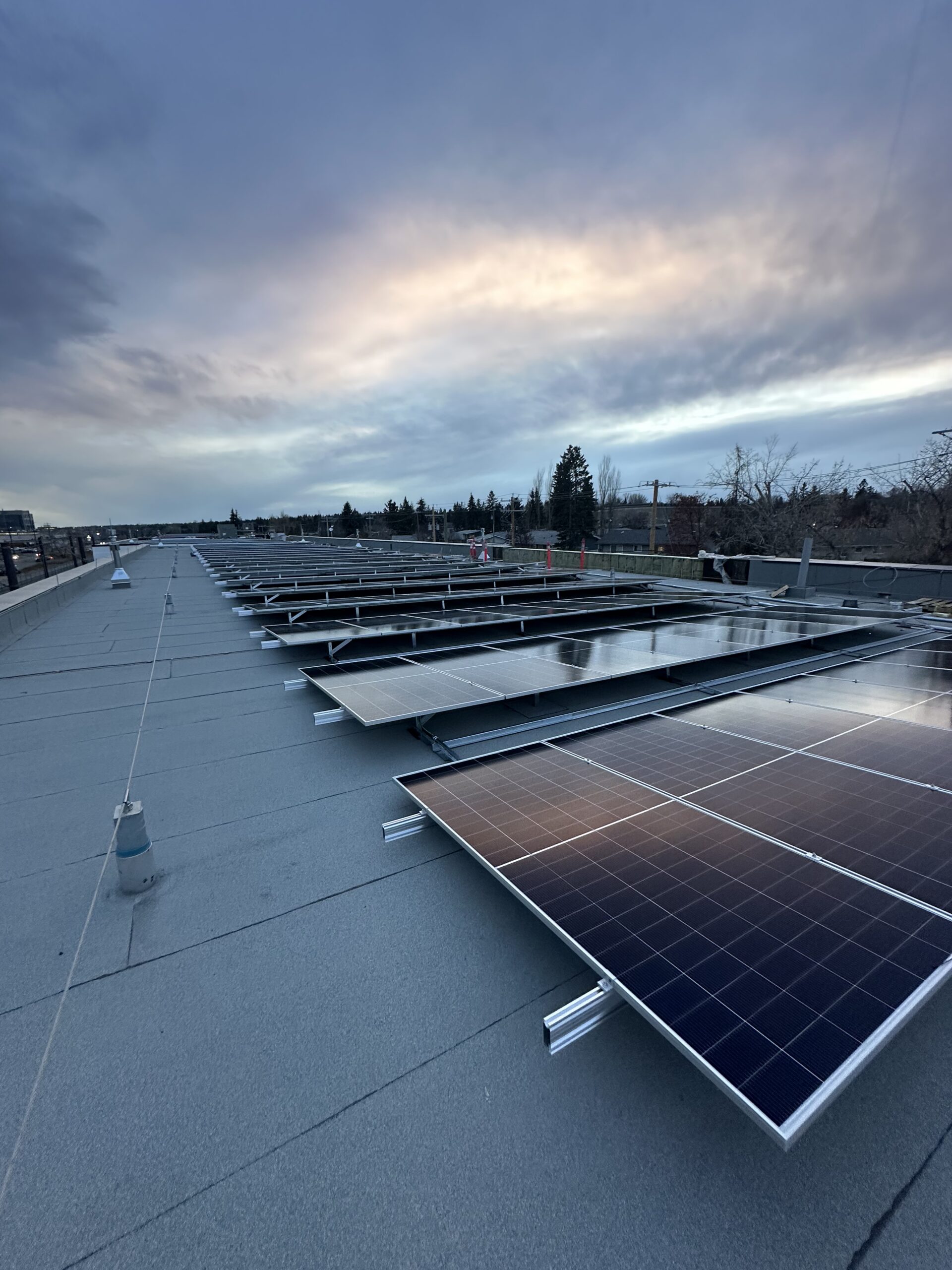 Haysboro LRT SE Calgary commercial solar installation by Rocky Mountain Solar Co. featuring IKO Diamond Shield integrated roofing.