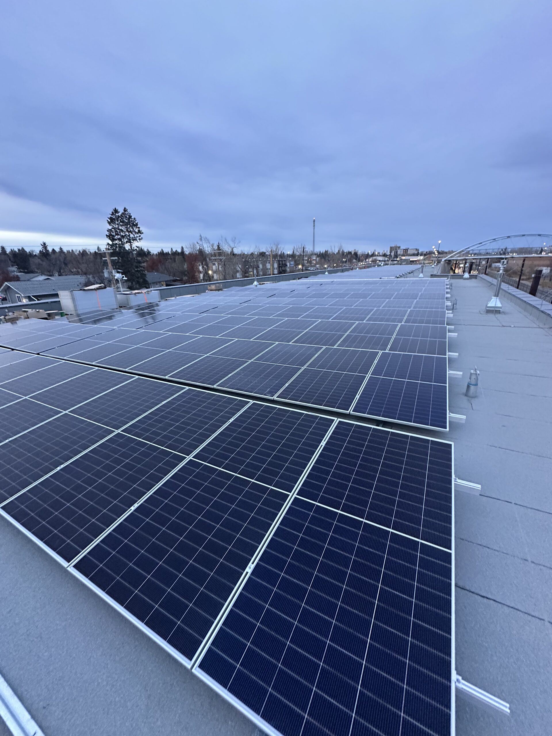 Aerial view of the 230 kW Haysboro LRT solar installation in Calgary, featuring IKO Diamond Shield roofing integration.